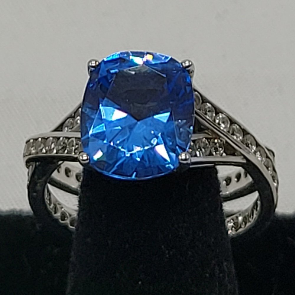 Jean Dousset 925 crisscross ring with a blue stone